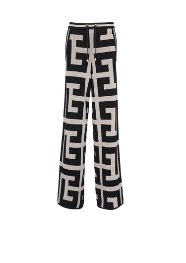 Pantaloni ampi in maglia con maxi monogramma Balmain